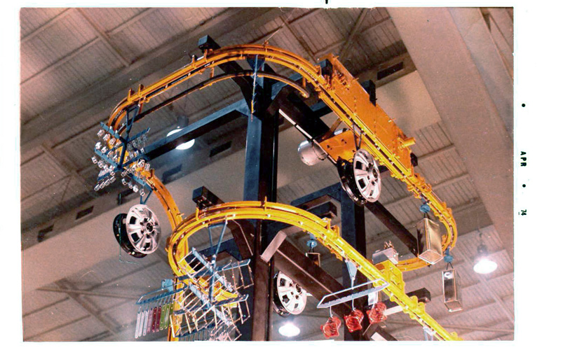 Automotive transport for the treatment of industrial paint